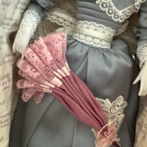 Vintage woman with umbrella. 17 inch. Porcelain doll. Franklin heirloom .